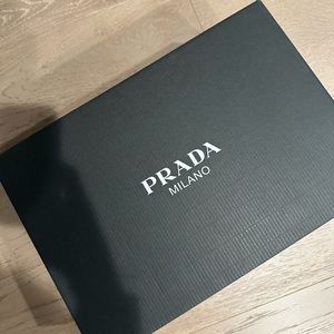 Prada men’s sneaker box, brand new.  Packing and shoe covers included inside